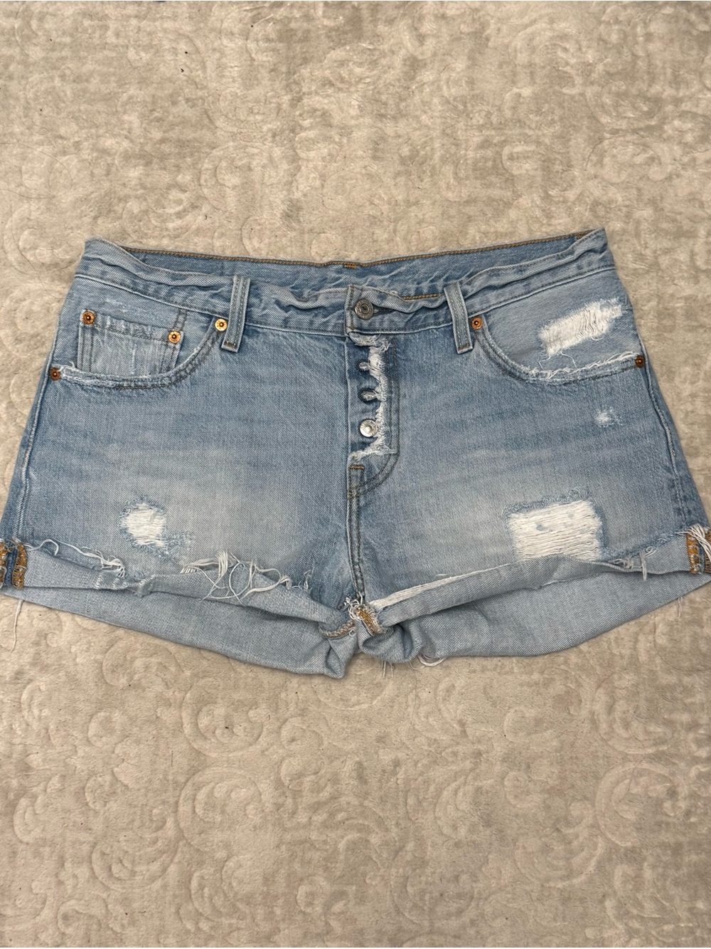 Vintage Levi's Light Blue Distressed Denim Shorts with Button Fly size 28